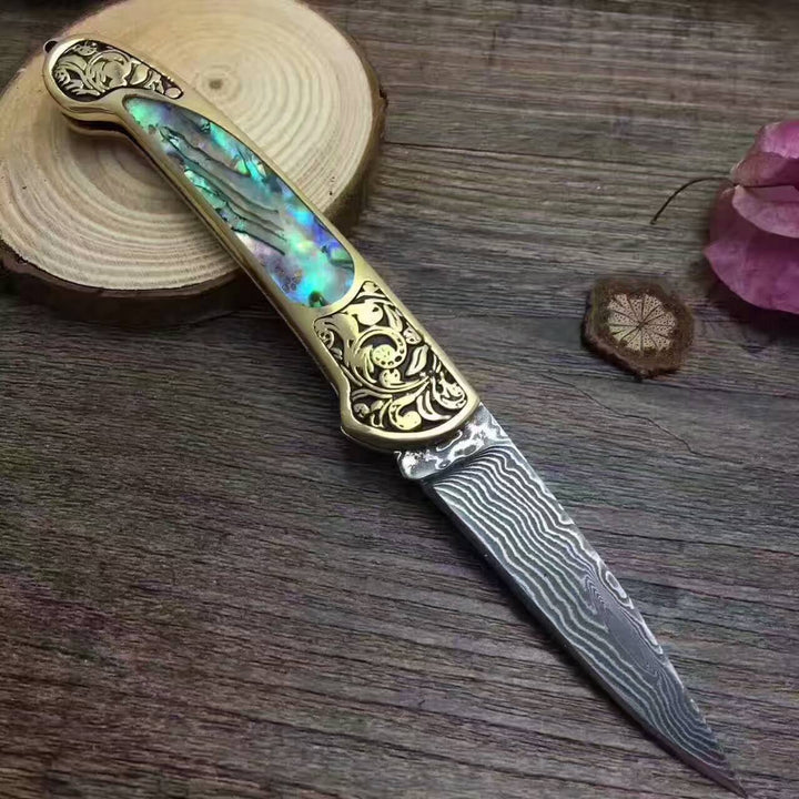 Unleash Your Survival Instincts with the Ultimate Hunting Folding Survival Combat Knife